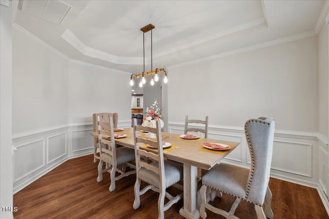 1704 Fawn Chase Ct, Wake Forest, NC 27587 - dining area with a raised ceiling, wood finished floors, wainscoting, crown molding, and a decorative wall