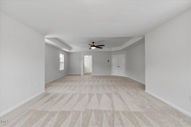 1704 Fawn Chase Ct, Wake Forest, NC 27587 - spare room with a ceiling fan, light colored carpet, and baseboards