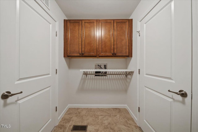 1704 Fawn Chase Ct, Wake Forest, NC 27587 - laundry area with baseboards, cabinet space, and hookup for a washing machine