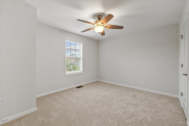 1704 Fawn Chase Ct, Wake Forest, NC 27587 - spare room featuring carpet floors, ceiling fan, and baseboards
