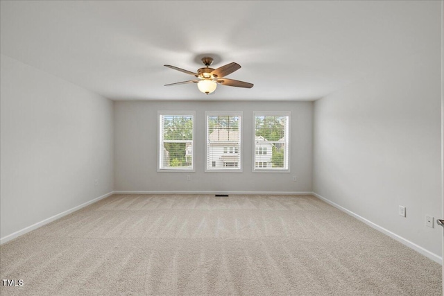 1704 Fawn Chase Ct, Wake Forest, NC 27587 - spare room with ceiling fan, baseboards, and light colored carpet