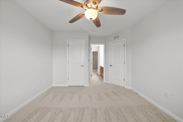 1704 Fawn Chase Ct, Wake Forest, NC 27587 - unfurnished bedroom with baseboards, carpet flooring, and ceiling fan
