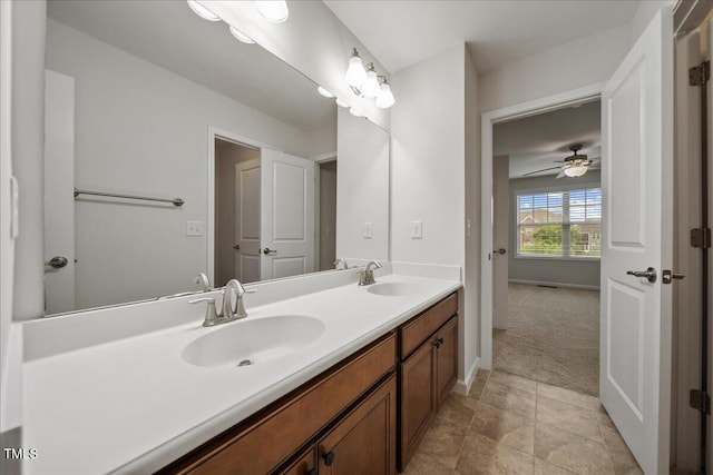 1704 Fawn Chase Ct, Wake Forest, NC 27587 - bathroom featuring double vanity, ceiling fan, and baseboards