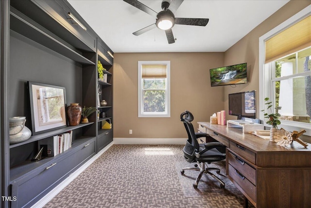 12636 Old Creedmoor Rd, Raleigh, NC 27613 - carpeted home office featuring plenty of natural light, baseboards, and a ceiling fan