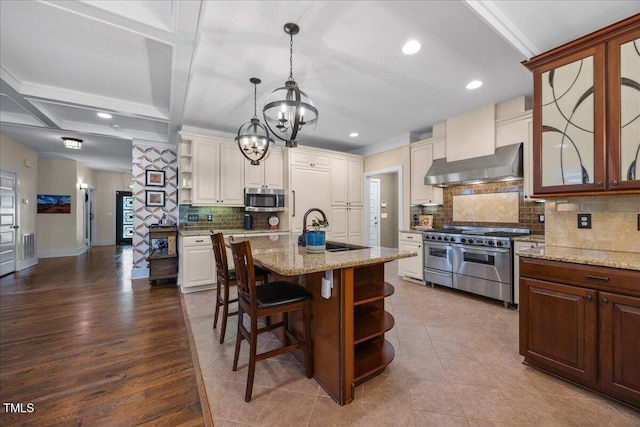 12636 Old Creedmoor Rd, Raleigh, NC 27613 - kitchen featuring stainless steel appliances, open shelves, extractor fan, a sink, and tasteful backsplash