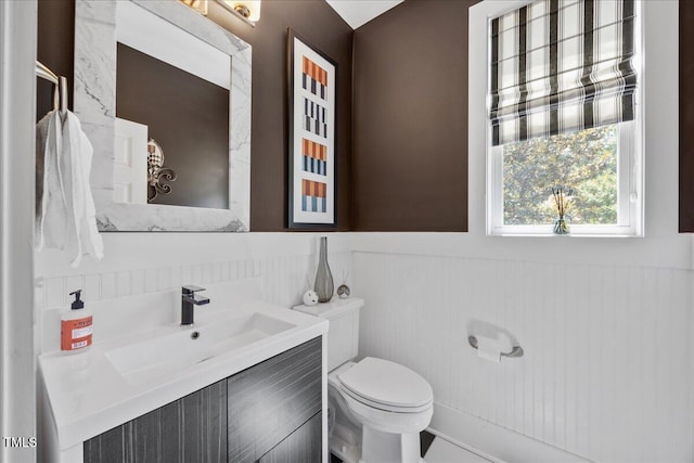 12636 Old Creedmoor Rd, Raleigh, NC 27613 - bathroom with wainscoting, toilet, and vanity