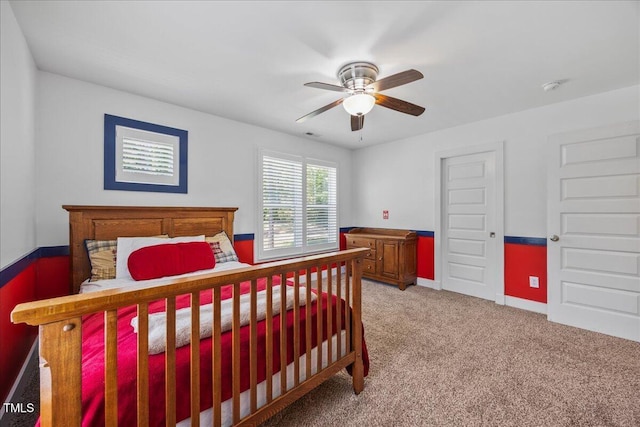 12636 Old Creedmoor Rd, Raleigh, NC 27613 - bedroom with light colored carpet, a ceiling fan, and baseboards