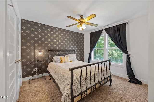 12636 Old Creedmoor Rd, Raleigh, NC 27613 - bedroom with wallpapered walls, carpet, baseboards, and ceiling fan