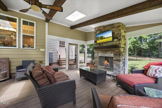 12636 Old Creedmoor Rd, Raleigh, NC 27613 - deck with an outdoor living space with a fireplace and ceiling fan