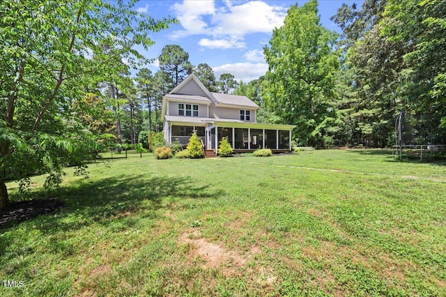 12636 Old Creedmoor Rd, Raleigh, NC 27613 - view of front of house featuring a trampoline, a sunroom, and a front yard