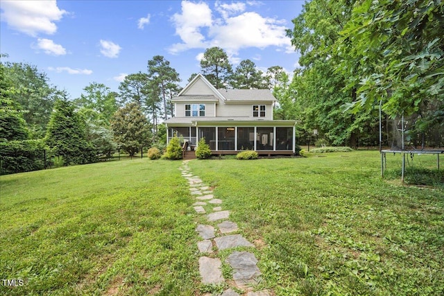 12636 Old Creedmoor Rd, Raleigh, NC 27613 - view of front of home featuring a trampoline, a sunroom, and a front yard