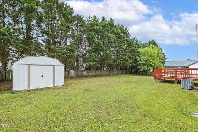 366 E Smithfield St, Angier, NC 27501 - view of yard with a wooden deck and central air condition unit