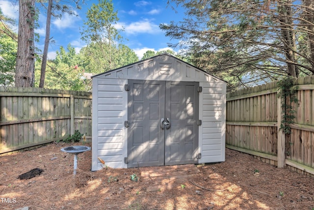 8361 Mcguire Dr, Raleigh, NC 27616 - view of shed featuring a fenced backyard