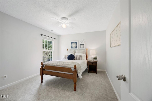 4805 Castle Crest Ct, Raleigh, NC 27616 - bedroom with light colored carpet, baseboards, a textured ceiling, and ceiling fan