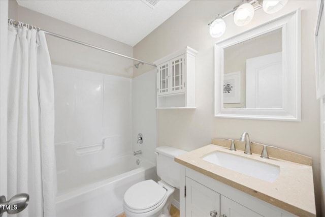 4805 Castle Crest Ct, Raleigh, NC 27616 - bathroom featuring toilet, shower / bath combination with curtain, and vanity