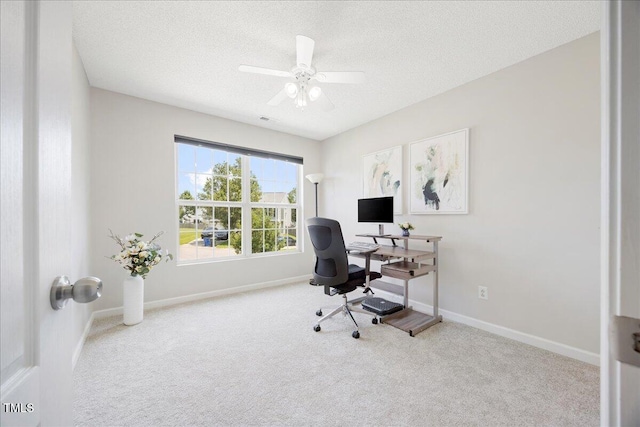 4805 Castle Crest Ct, Raleigh, NC 27616 - home office with carpet floors, a textured ceiling, ceiling fan, and baseboards