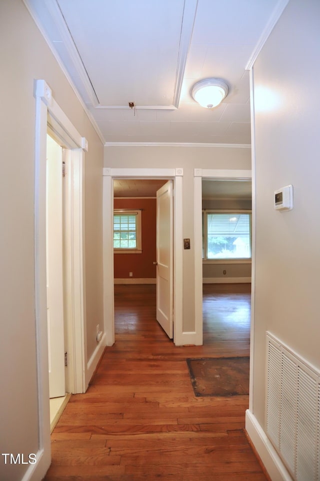 2006 N Ashland Dr, Burlington, NC 27217 - hallway with crown molding, wood finished floors, and baseboards