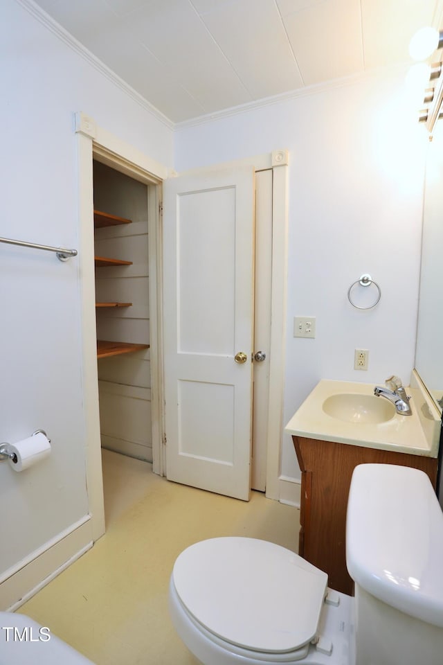 2006 N Ashland Dr, Burlington, NC 27217 - bathroom with toilet, vanity, and crown molding