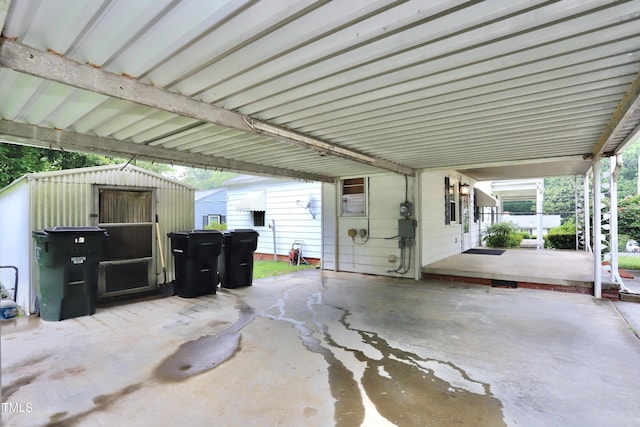 2006 N Ashland Dr, Burlington, NC 27217 - view of patio with an attached carport