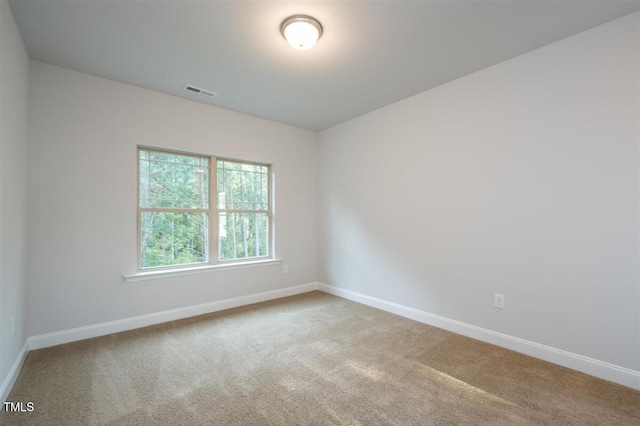 120 Newport Lndg Unit 99, Garner, NC 27529 - carpeted spare room with baseboards