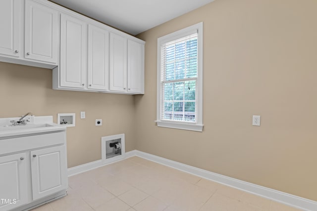 225 Norwalk St, Holly Springs, NC 27540 - laundry room with electric dryer hookup, cabinet space, baseboards, washer hookup, and light tile patterned flooring