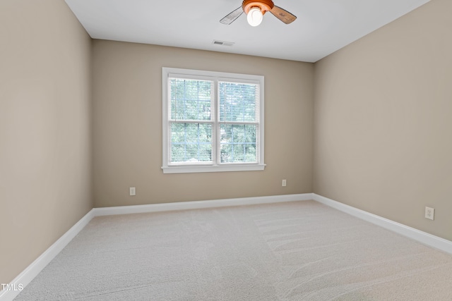 225 Norwalk St, Holly Springs, NC 27540 - spare room featuring ceiling fan, light colored carpet, and baseboards