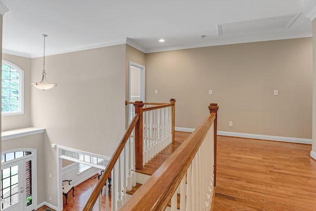 225 Norwalk St, Holly Springs, NC 27540 - hall featuring an upstairs landing, crown molding, light wood-style flooring, recessed lighting, and baseboards
