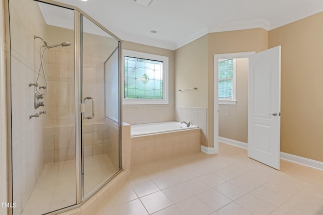 225 Norwalk St, Holly Springs, NC 27540 - full bath featuring a bath, a stall shower, tile patterned floors, crown molding, and baseboards