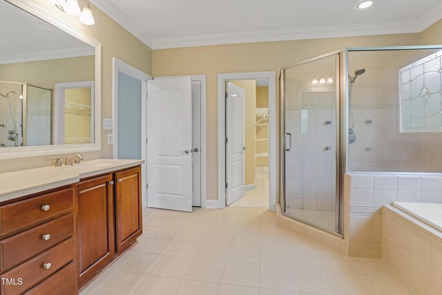 225 Norwalk St, Holly Springs, NC 27540 - bathroom with vanity, a shower stall, a bath, tile patterned floors, and ornamental molding