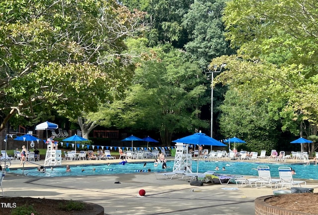 200 Greensview Dr, Cary, NC 27518 - community pool with a patio area