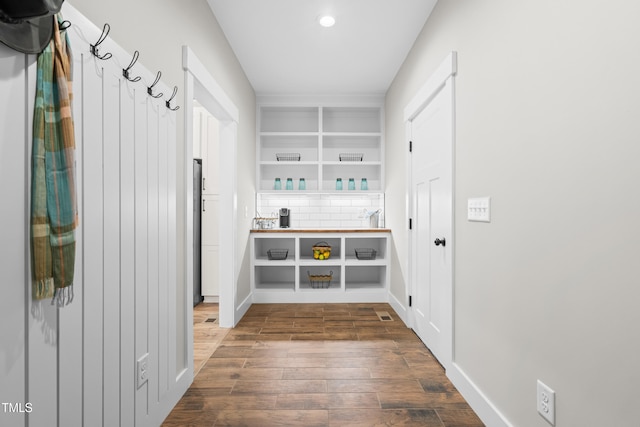 1004 Snow Peak Ct, Raleigh, NC 27603 - mudroom with dark wood-style flooring and recessed lighting