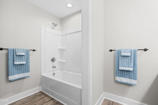 1004 Snow Peak Ct, Raleigh, NC 27603 - full bath featuring wood finished floors and tub / shower combination