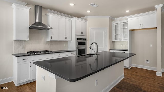 194 Gilmer St, Fuquay Varina, NC 27526 - kitchen with wall chimney range hood, appliances with stainless steel finishes, a sink, dark countertops, and baseboards