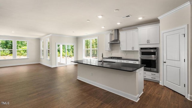 194 Gilmer St, Fuquay Varina, NC 27526 - kitchen with wall chimney range hood, a sink, double oven, dark countertops, and open floor plan