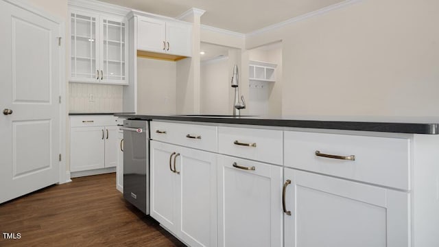 194 Gilmer St, Fuquay Varina, NC 27526 - kitchen featuring a sink, dark countertops, dark wood-type flooring, glass insert cabinets, and crown molding