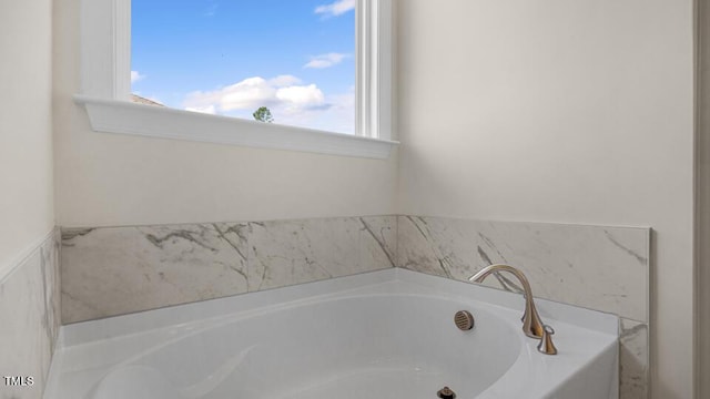 194 Gilmer St, Fuquay Varina, NC 27526 - bathroom with plenty of natural light and a garden tub