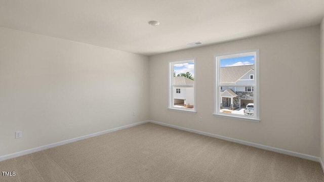 194 Gilmer St, Fuquay Varina, NC 27526 - unfurnished room featuring light colored carpet and baseboards