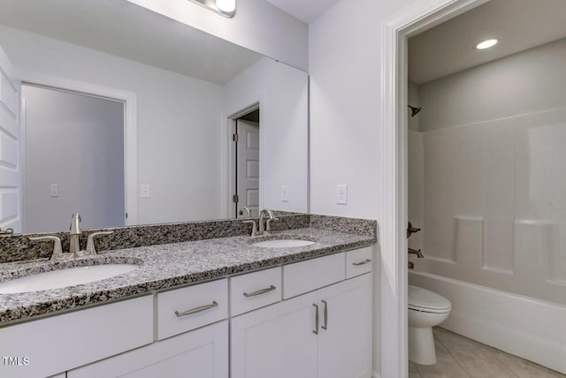 2309 Redbridge Ln, Apex, NC 27502 - full bath with double vanity, toilet, tile patterned floors, and bathing tub / shower combination