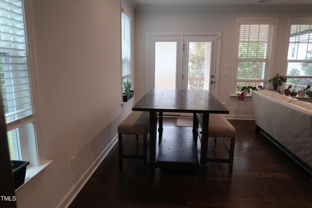 2309 Redbridge Ln, Apex, NC 27502 - dining room featuring plenty of natural light, baseboards, and dark wood-style flooring