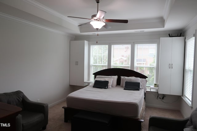 2309 Redbridge Ln, Apex, NC 27502 - bedroom featuring a raised ceiling, crown molding, carpet floors, baseboards, and ceiling fan
