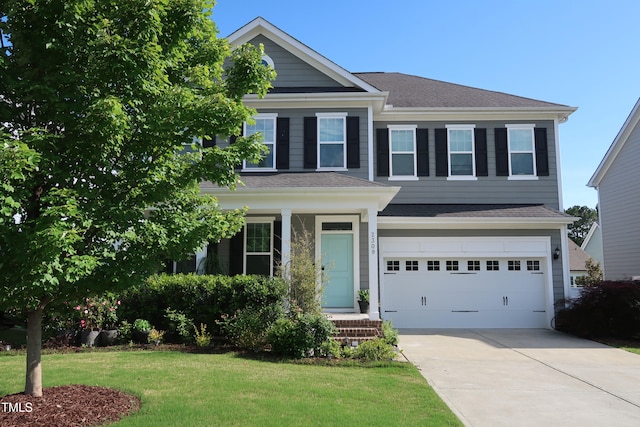 2309 Redbridge Ln, Apex, NC 27502 - traditional-style home featuring concrete driveway, an attached garage, a front yard, and roof with shingles
