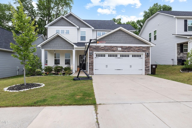 389 Whetstone Dr, Angier, NC 27501 - view of front of house with a garage, stone siding, concrete driveway, and a front lawn