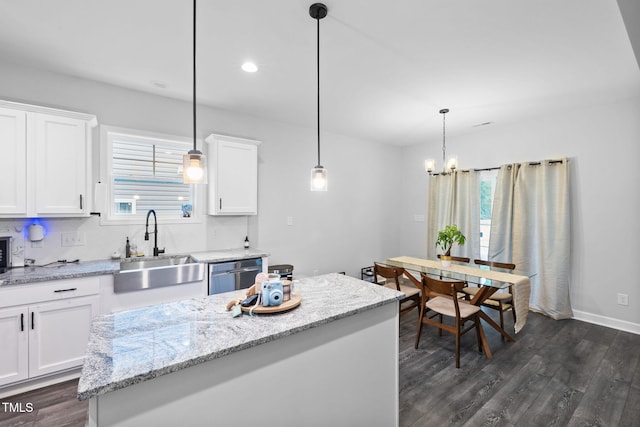 389 Whetstone Dr, Angier, NC 27501 - kitchen with a sink, dark wood-type flooring, healthy amount of natural light, white cabinetry, and recessed lighting