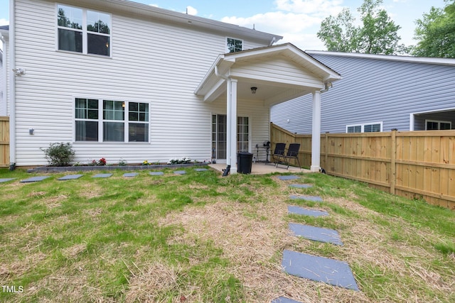 389 Whetstone Dr, Angier, NC 27501 - back of house featuring a patio