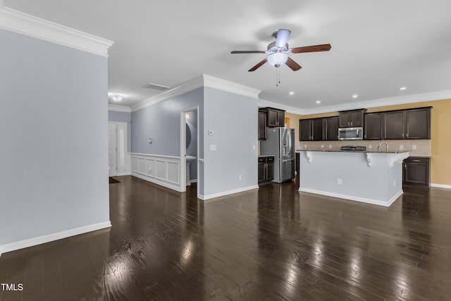 211 Westgrove Ct, Durham, NC 27703 - unfurnished living room featuring a ceiling fan, a sink, dark wood-style floors, crown molding, and recessed lighting