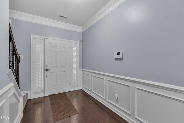 211 Westgrove Ct, Durham, NC 27703 - entryway with ornamental molding, wainscoting, and dark wood-type flooring