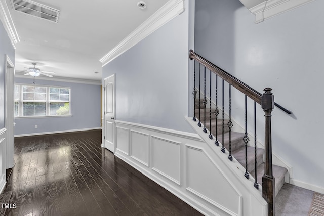 211 Westgrove Ct, Durham, NC 27703 - stairway with ornamental molding, wood finished floors, a wainscoted wall, and ceiling fan