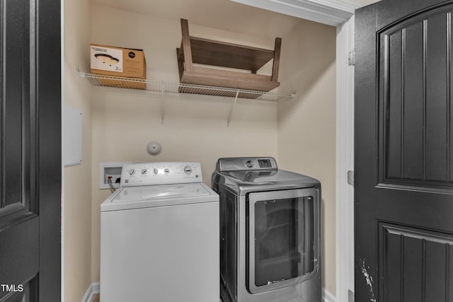 211 Westgrove Ct, Durham, NC 27703 - laundry room featuring washer and dryer and baseboards