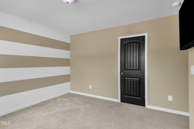 211 Westgrove Ct, Durham, NC 27703 - empty room with baseboards, carpet, and a smoke detector