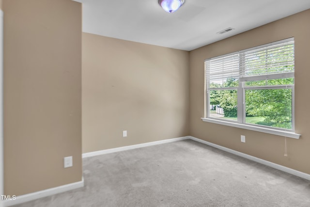 211 Westgrove Ct, Durham, NC 27703 - spare room featuring baseboards and carpet floors